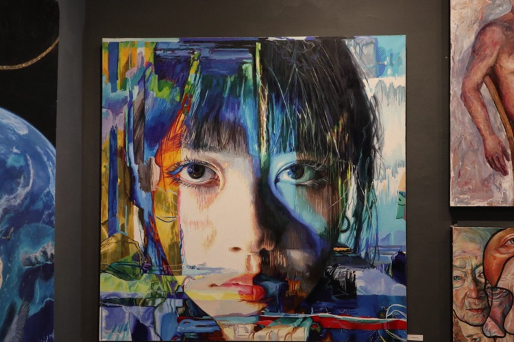 Portrait painting hung in a gallery