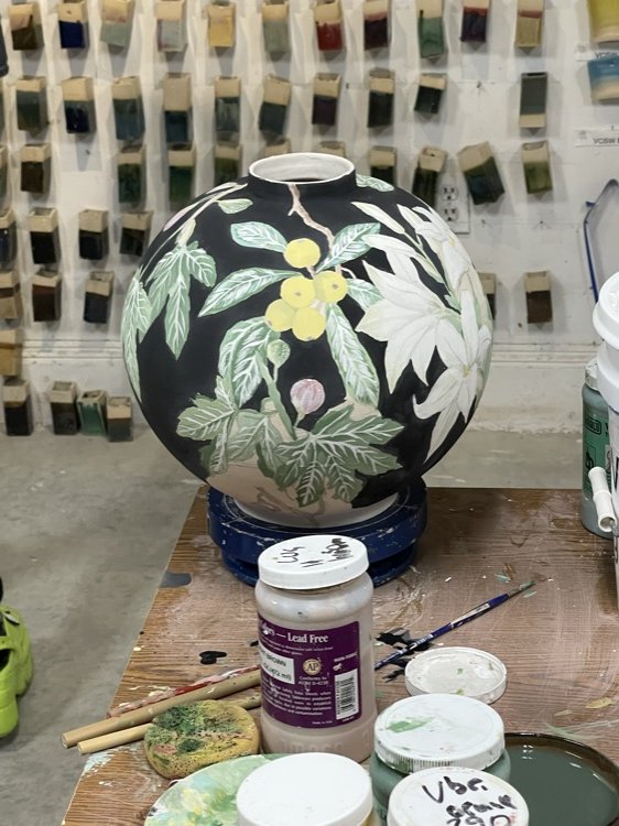 Painted moon jar in the ceramics studio