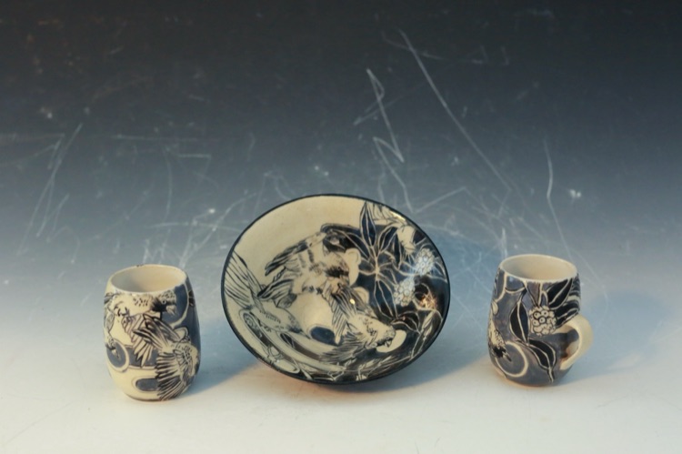 Blue and white ceramic bowl and mugs