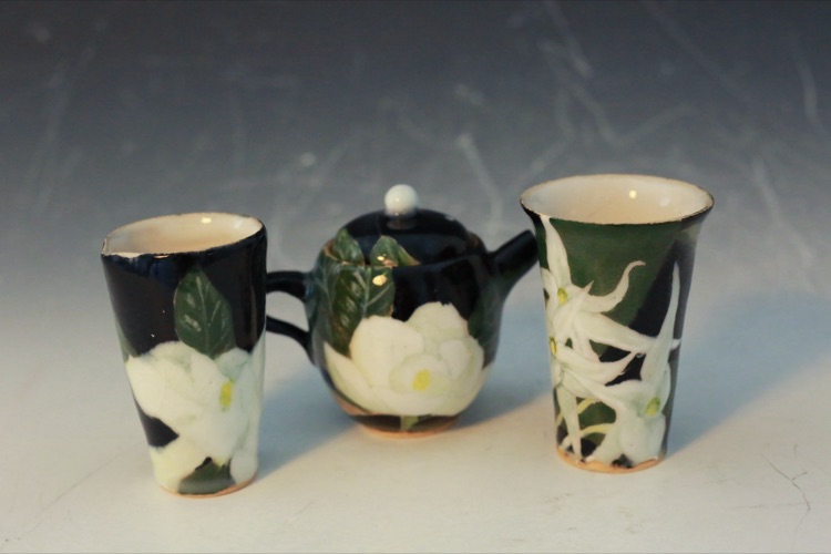 Porcelain tea set with magnolia flowers